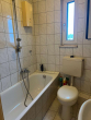 Badezimmer - 4-Zimmer-Mietwohnung im Maisonette-Stil mit Balkon im zentraler Lage