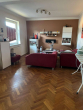 Wohnzimmer - 4-Zimmer-Mietwohnung im Maisonette-Stil mit Balkon im zentraler Lage