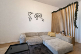Wohnzimmer - FEINE 3-ZIMMER-WOHNUNG MIT GARTEN IN SPITZENLAGE