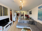 Wohnzimmer - KLASSE INVESTMENT MIT SICHERER MIETE – 2 ZI APARTMENT & GARAGE